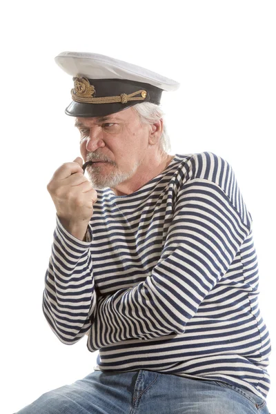 Old sailor man smokes pipe — Stock Photo, Image