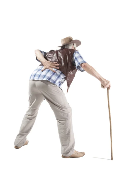 Senior férfi gyaloglás-val cukornád — Stock Fotó