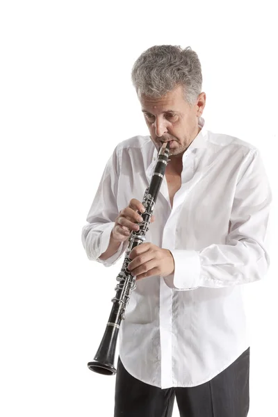 Homem tocando clarinete — Fotografia de Stock