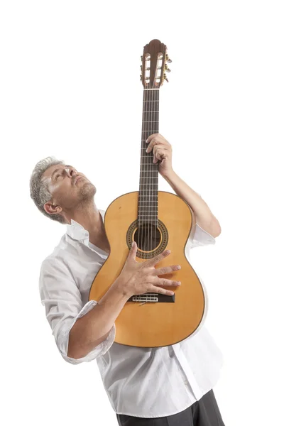 Homem tocando guitarra acústica — Fotografia de Stock