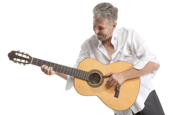 Homem tocando guitarra acústica — Fotografia de Stock