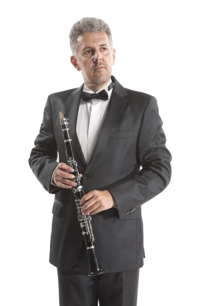 Homem segurando clarinete — Fotografia de Stock