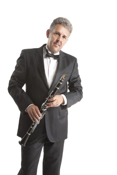 Homem segurando clarinete — Fotografia de Stock