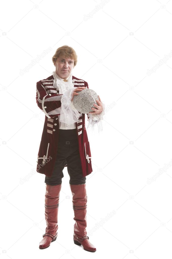 man in medieval clothes with decorative ball