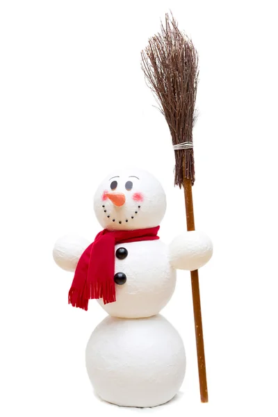 Boneco de neve com cachecol vermelho e vassoura — Fotografia de Stock