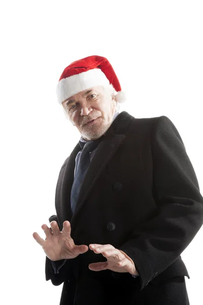 Senior affärsman i santa hatt — Stockfoto