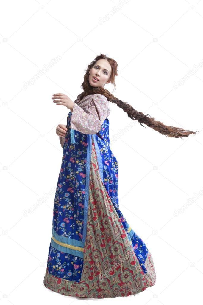 Woman dancing in russian folk dress