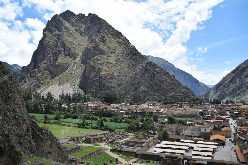 View of the town Ollantaytambo (called by locals Ollanta) and the mountains surrounding the town. It's located in the Sacred Valley of the Incas near Cuzco in Peru.