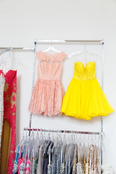 Evening dresses on hangers — Stock Photo, Image