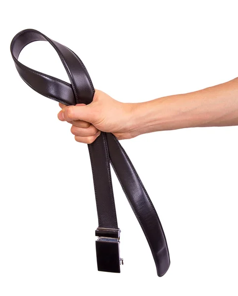 Mano humana sosteniendo un cinturón de cuero negro — Foto de Stock