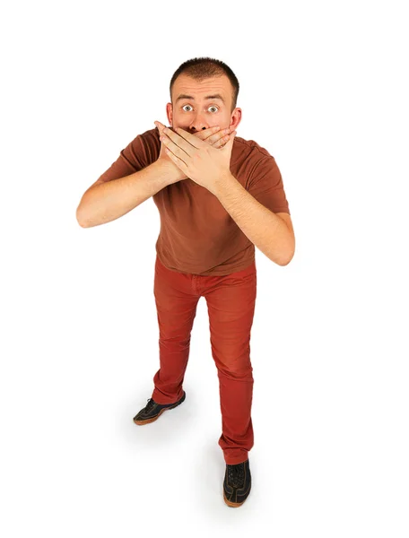 Jeune homme fermé sa bouche avec les deux mains — Photo