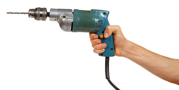 Man's hand holds a drill