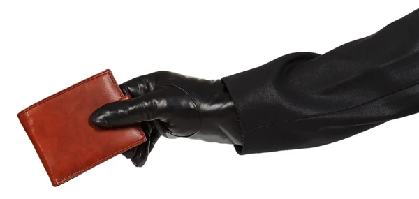 Zloděj v černém obleku drží hnědá kožená kabelka — Stock fotografie