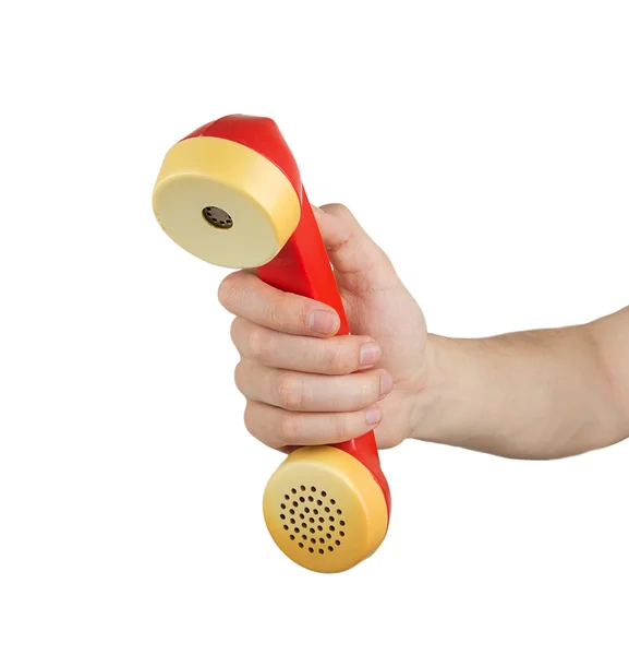 Hand bedrijf rode telefoonhoorn — Stockfoto