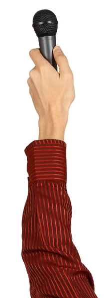 La mano del hombre en una camisa roja sosteniendo un micrófono — Foto de Stock