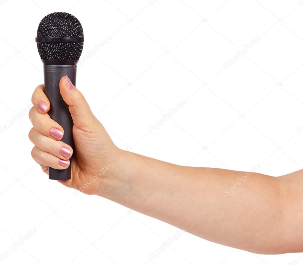 Female hand holding a microphone