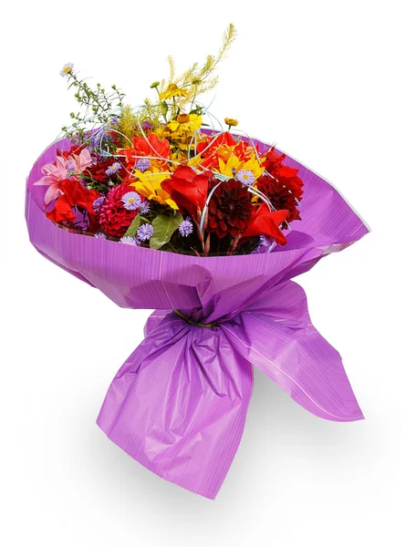 Bouquet of flowers in purple paper — Stock Photo, Image