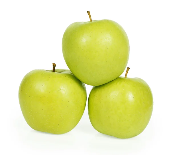 Tre mogna gröna äpplen — Stockfoto