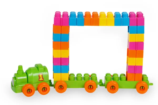 Train of colorful childrens building bricks with frame — Stock Photo, Image