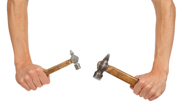Dois martelos velhos nas mãos — Fotografia de Stock