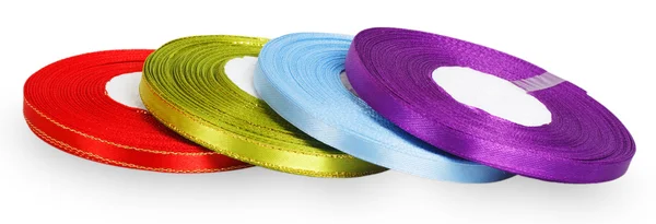 Bright spools satin ribbons — Stock Photo, Image