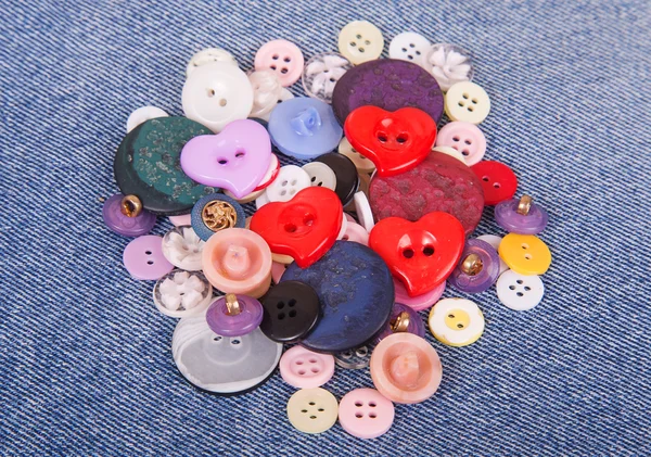 Sewing color buttons — Stock Photo, Image