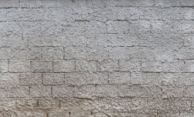 arka plan olarak gri Dekoratif Sıva ile tuğla duvar