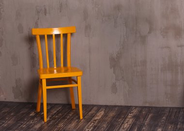 Yellow wooden chair in nterior room  clipart