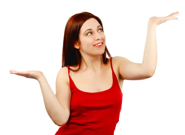 Young woman holding her hands out as if balancing or weighing so — Stock Photo, Image