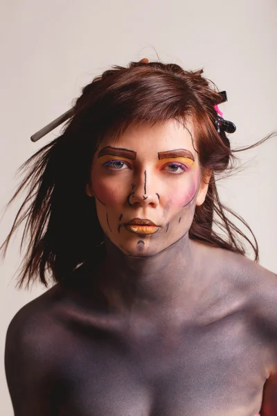 Portret van mooie jonge vrouw met creatieve popart make-up — Stockfoto