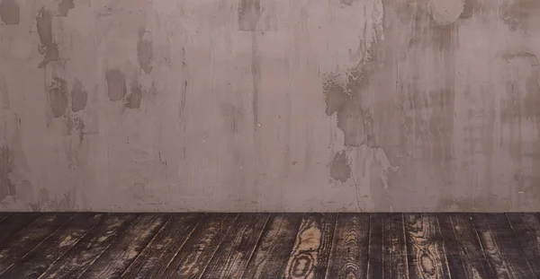 Chambre intérieure avec mur de plâtre décoratif gris et bois foncé — Photo