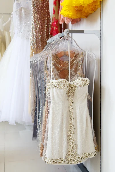 Evening dress on hangers in store — Stok Foto