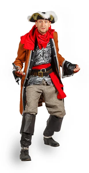 Молодой человек в пиратском костюме с пистолетом — стоковое фото