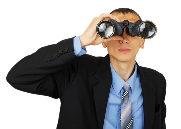 Business man wearing suit with blue tie with binoculars — Stock Photo, Image