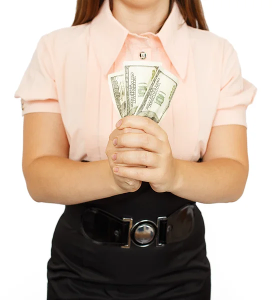 Молодая женщина с долларами в руках — стоковое фото