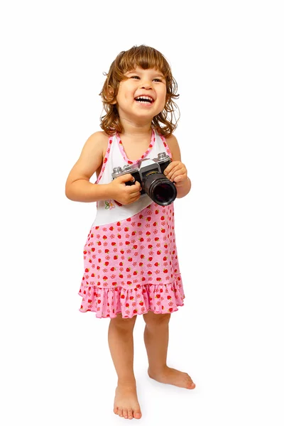 Маленькая милая девочка с камерой — стоковое фото