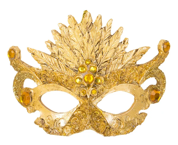 Золотая маска на елке — стоковое фото