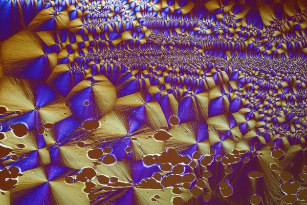 Färgglada micro kristaller i polariserat ljus — Stockfoto