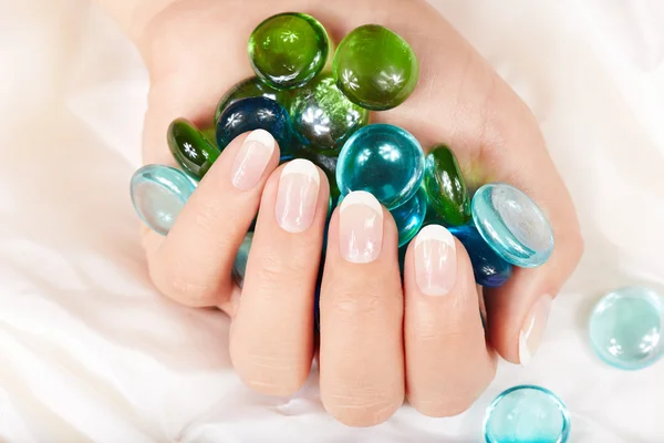 Hand with french manicured nails — Stock Photo, Image