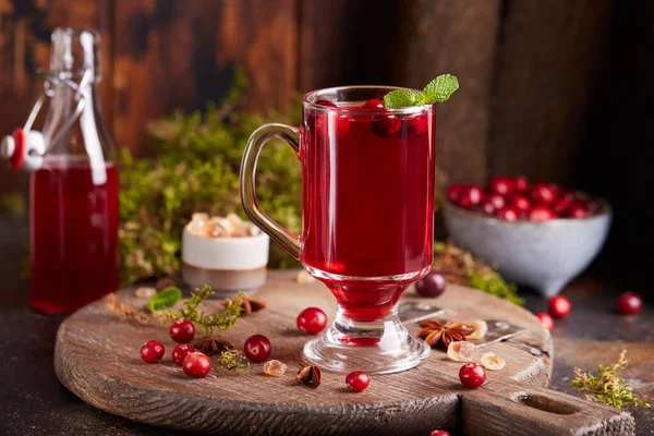 Healthy cranberry juice drink and fresh cranberries. Traditional Russian beverage mors. Cranberry tea.