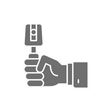 Göz muayenesi için araç ile el Gri simge.