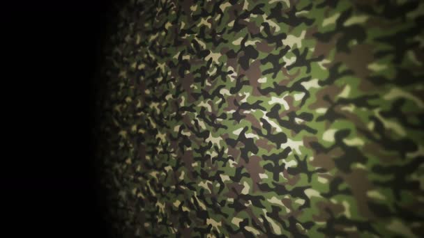 緑の迷彩パターンの背景 軍の制服コンセプト アブストラクトラインと波の質感 ループアニメーション — ストック動画