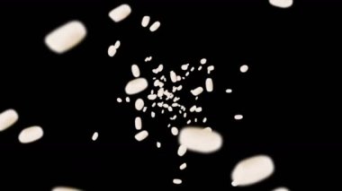 Siyah arka planda bir sürü pirinç uçurmak. Beyaz pirinç taneleri. Glutinous rice. Vejetaryen. Sağlıklı yiyecekler. Pirinç dönüşünün 3 boyutlu döngü animasyonu.