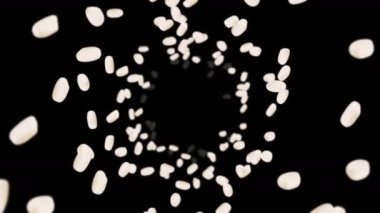 Siyah arka planda bir sürü pirinç uçurmak. Beyaz pirinç taneleri. Glutinous rice. Vejetaryen. Sağlıklı yiyecekler. Pirinç dönüşünün 3 boyutlu döngü animasyonu.