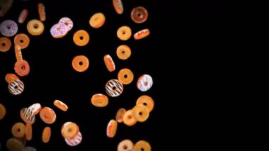 Siyah arka planda bir sürü renkli çörek uçurmak. Çörek, şekerleme, tatlı. Donut dönüşünün 3 boyutlu animasyonu. Döngü canlandırması.