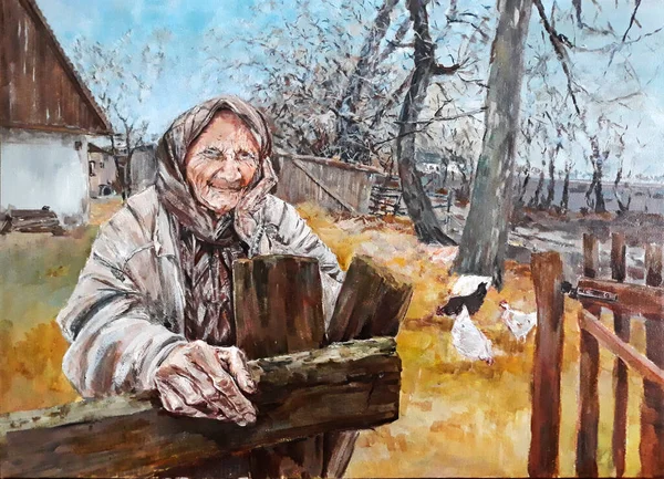 An old woman in a village is waiting for the winter. Autumn in the village of Eastern Europe.