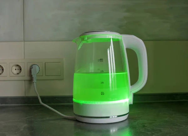 Plastic electric kettle with boiling water