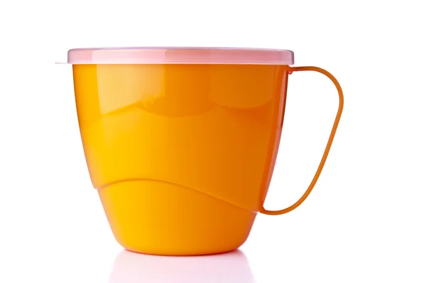 Yellow plastic cup on white background — Stock Photo, Image