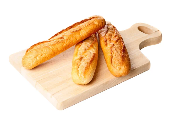 Хлеб на доске крупным планом — стоковое фото
