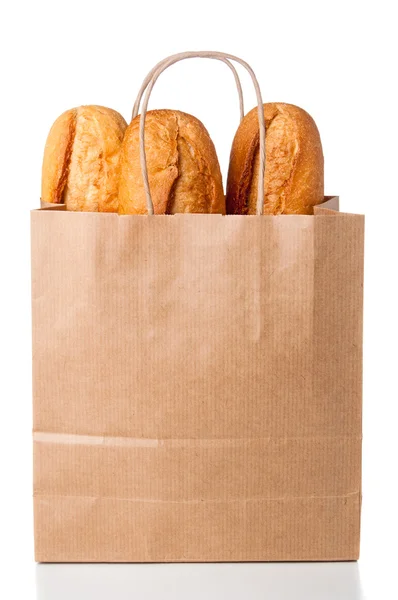 Beyaz arka plan üzerinde kağıt torba ekmek